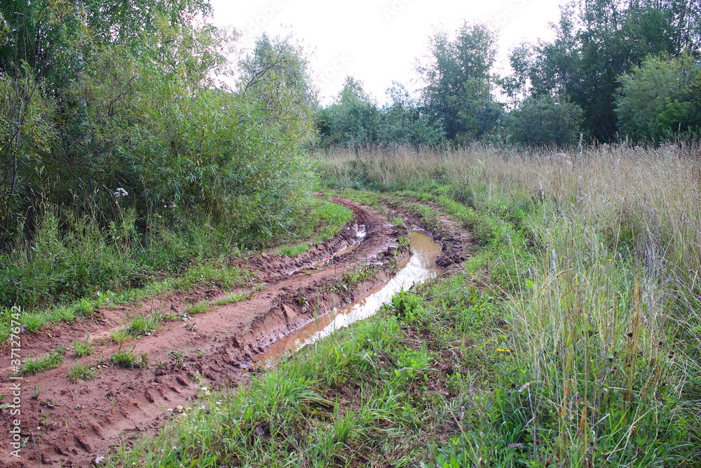 Fototapeta premium Muddy road after rain