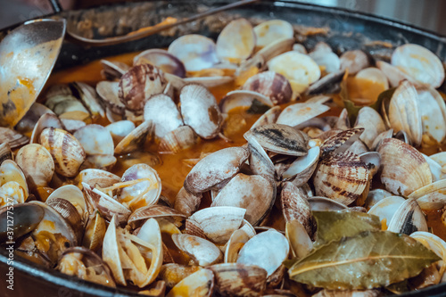 Clam casserole in tomato sauce