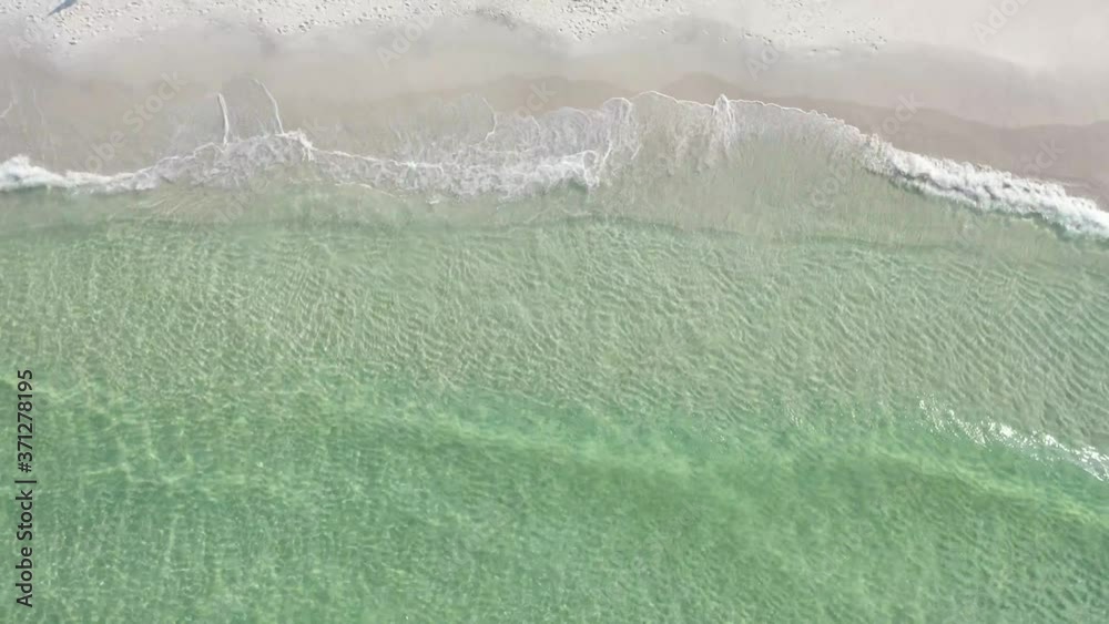Beach waves rolling onto shore in Florida - 30A