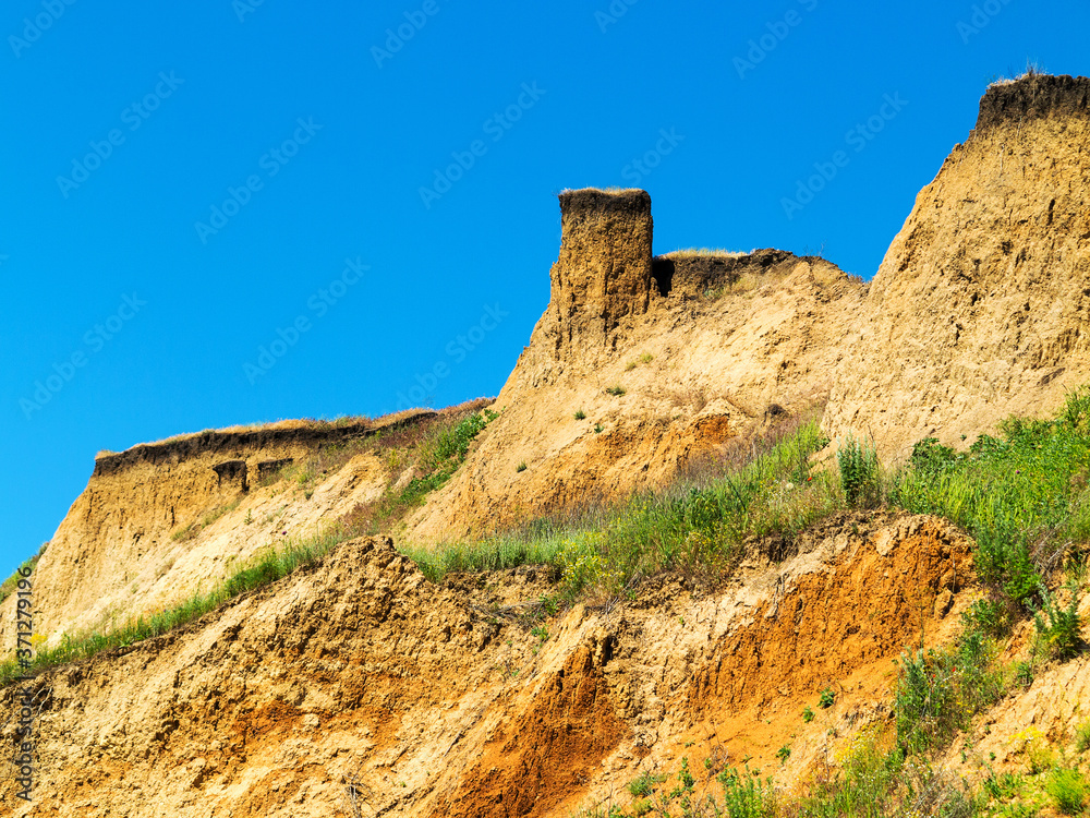 Landslide zone on Black Sea coast. Zone of natural disasters during rainy season. Large masses of earth slip along slope of hill, destroy houses. Landslide - threat to life