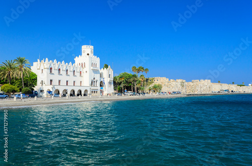 Kos, view of the embankment, office building and the wall of Neratzia Castle. Kos Island, Greece