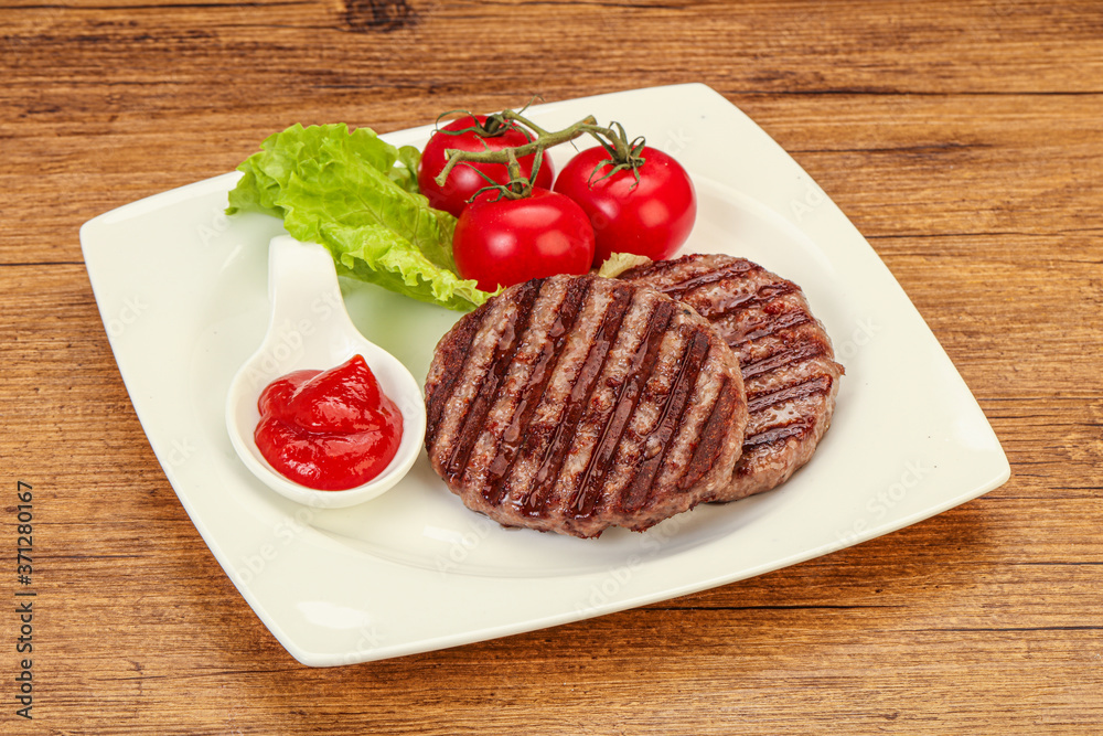 Grilled burger cutlet with sauce Grilled burger cutlet with sauce
