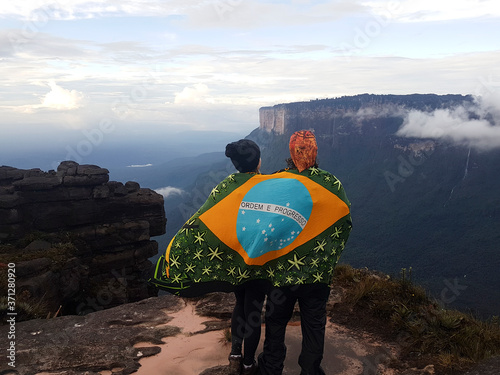 Young couple doing the hike on the trail to Monte Roraima photo