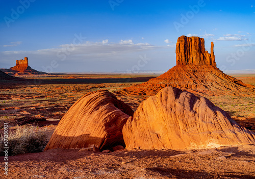 Monument valley west mitten and taylor rock sunset
