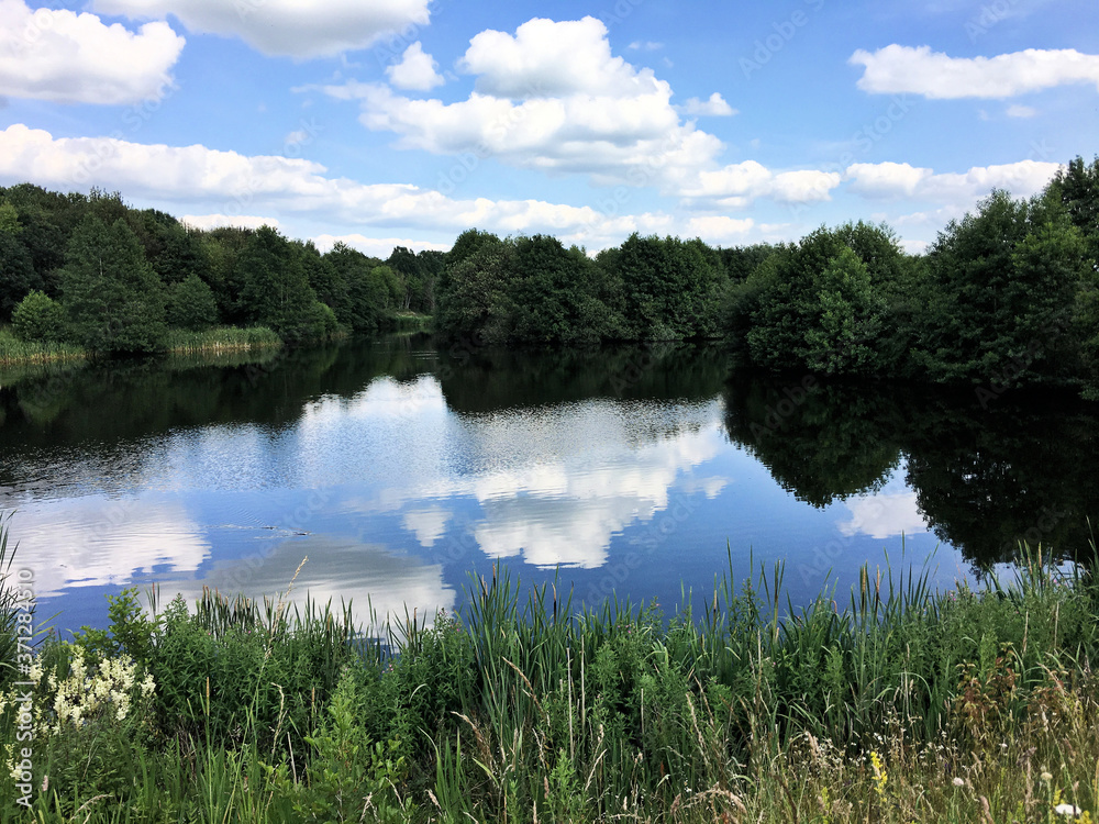 A view of Alderford lake in Shropshire with reflection A view of Alderford lake in Shropshire with reflection