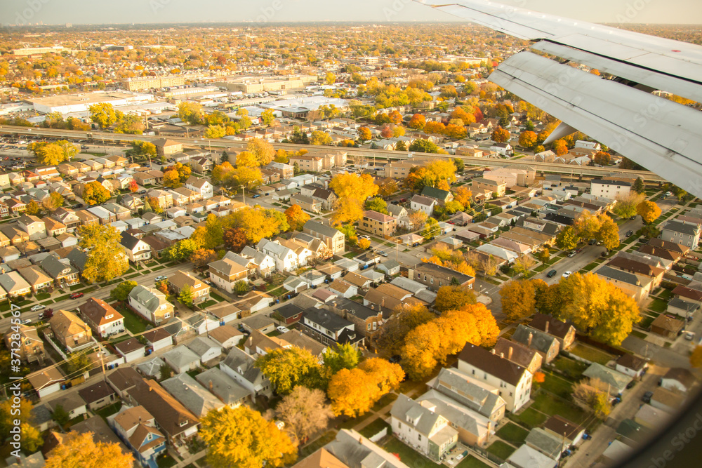 Chicago, IL;  A aerial view of a residential area near Midway International airport in Chicago, in the fall season with fall color at peak.