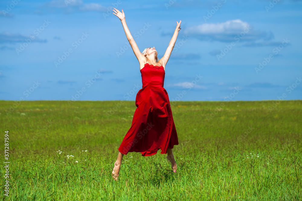 portrait of a young beautiful blonde woman in red dress portrait of a young beautiful blonde woman in red dress