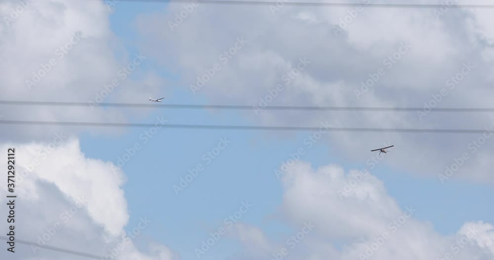 planes fly against the background of blue sky and clouds
planes fly against the background of blue sky and clouds