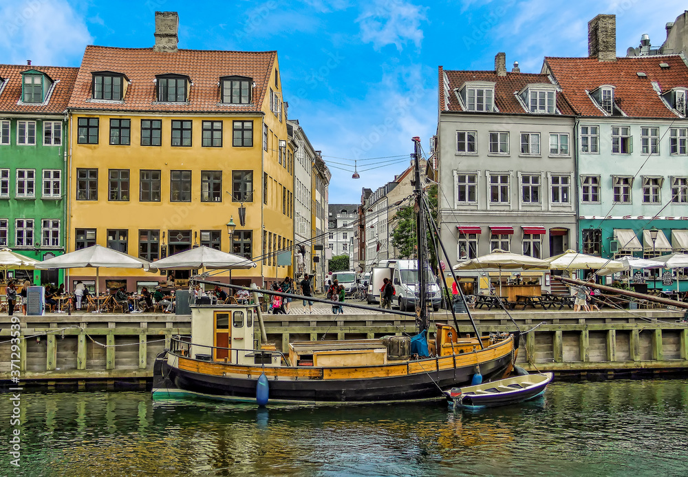 The picturesque waterfront district of Nyhavn in Copenhagen, Denmark in the summertime