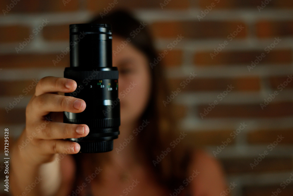 Fototapeta premium woman with lens