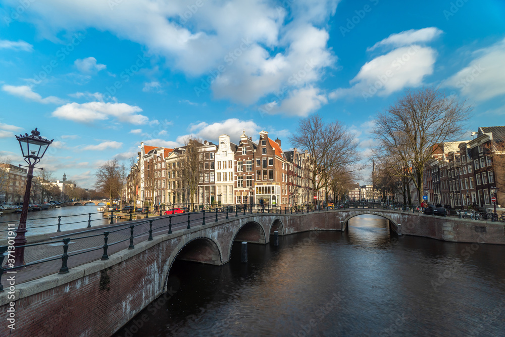 Amsterdam canal in sunny day, Amsterdam is the capital and most