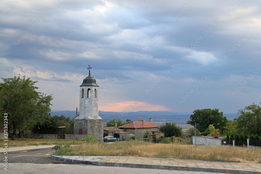 Church in the village of Avren (Bulgaria) in the evening at sunset