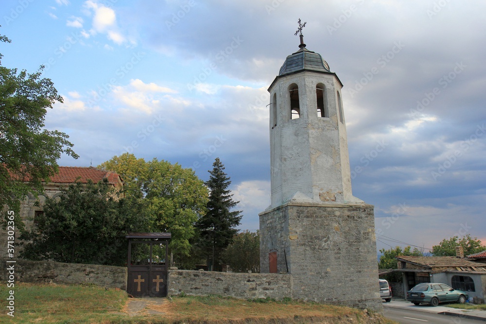 Church in the village of Avren (Bulgaria) in the evening at sunset