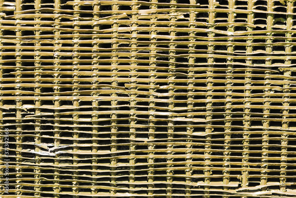 Detail of an old surface with exfoliated paint and rivets on military equipment. Military background. High quality photo Detail of an old surface with exfoliated paint and rivets on military equipment. Military background. High quality photo