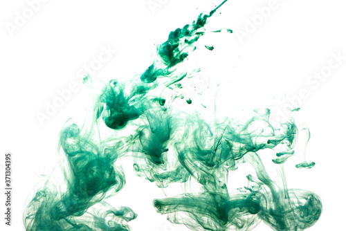 A cloud of green paint released into clear water. Isolate on a white background.