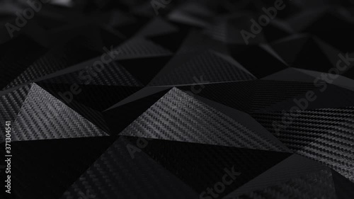 Carbon black triangular polygonal geometric background seamless motion loop. 3D animation
