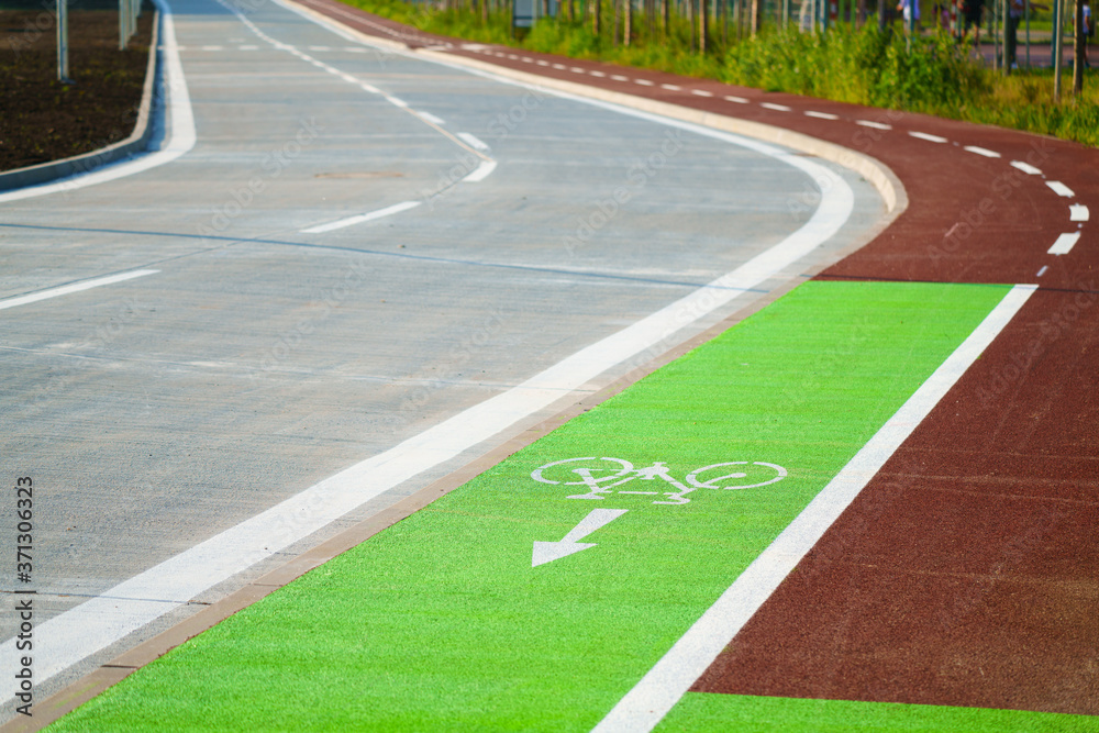 New cycling route in a modern city with a cyclist symbol