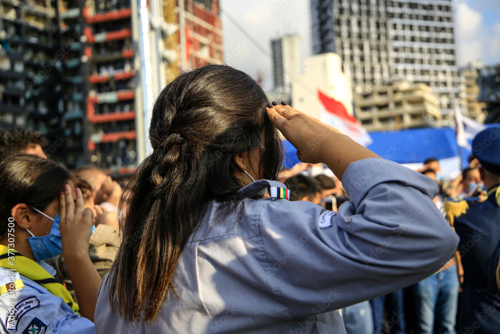 After one week of the catastrophic explosion in the Port of Beirut, Lebanese Scouts salute in honor of Beirut’s victims near the blast site. Beirut, Lebanon – August 11, 2020 After one week of the catastrophic explosion in the Port of Beirut, Lebanese Scouts salute in honor of Beirut’s victims near the blast site. Beirut, Lebanon – August 11, 2020