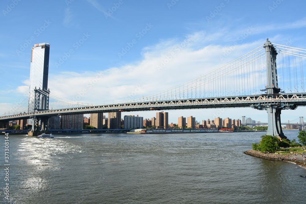 Brooklyn, USA - June 09, 2019: Relaxing place Brooklyn Bridge Park with beautiful panoramic view to Manhattan Brooklyn, USA - June 09, 2019: Relaxing place Brooklyn Bridge Park with beautiful panoramic view to Manhattan