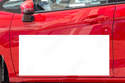 Blank White Magnetic Sign on Red Car Door