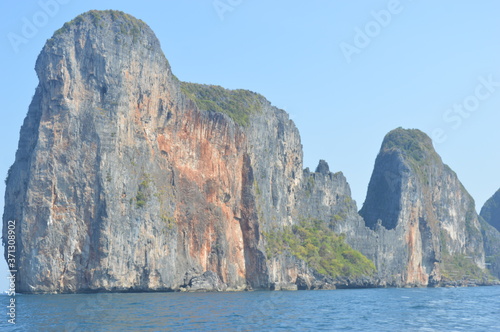 Sea Rocks around blue sea in phi phi island