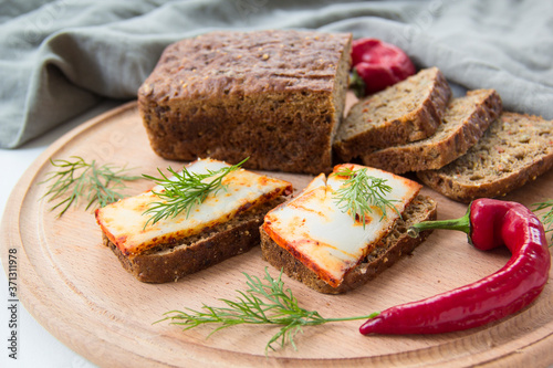 Delicious bread with garlic, lard, herbs, and chili