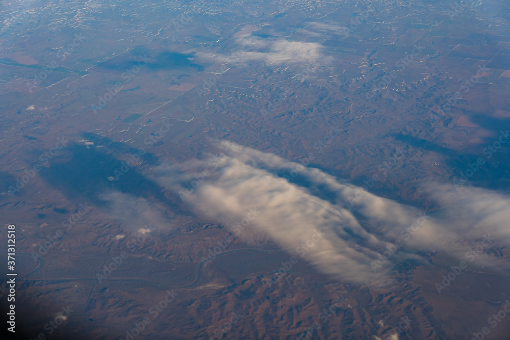 Land and clouds from the sky