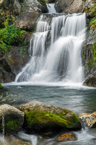 Fototapeta Naklejka Na Ścianę i Meble -  Beautiful waterfall in Spain, from Vall de Nuria National Park in Catalonia, with long exposure technique