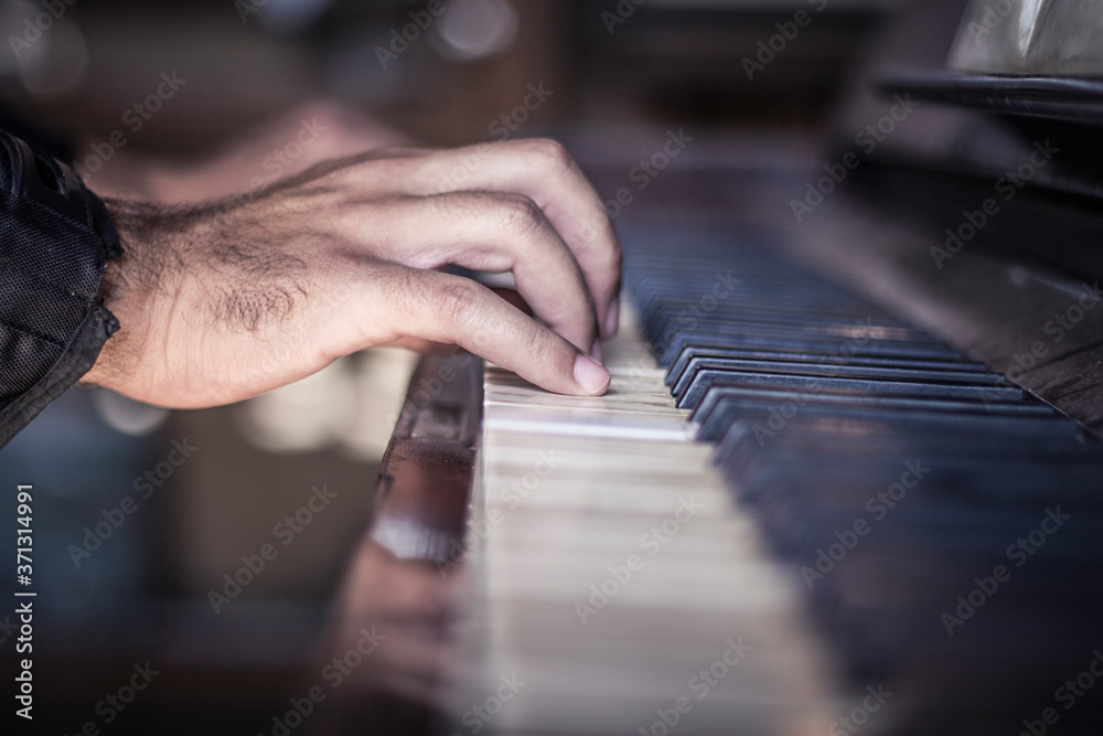 Fototapeta premium Hands playing the piano