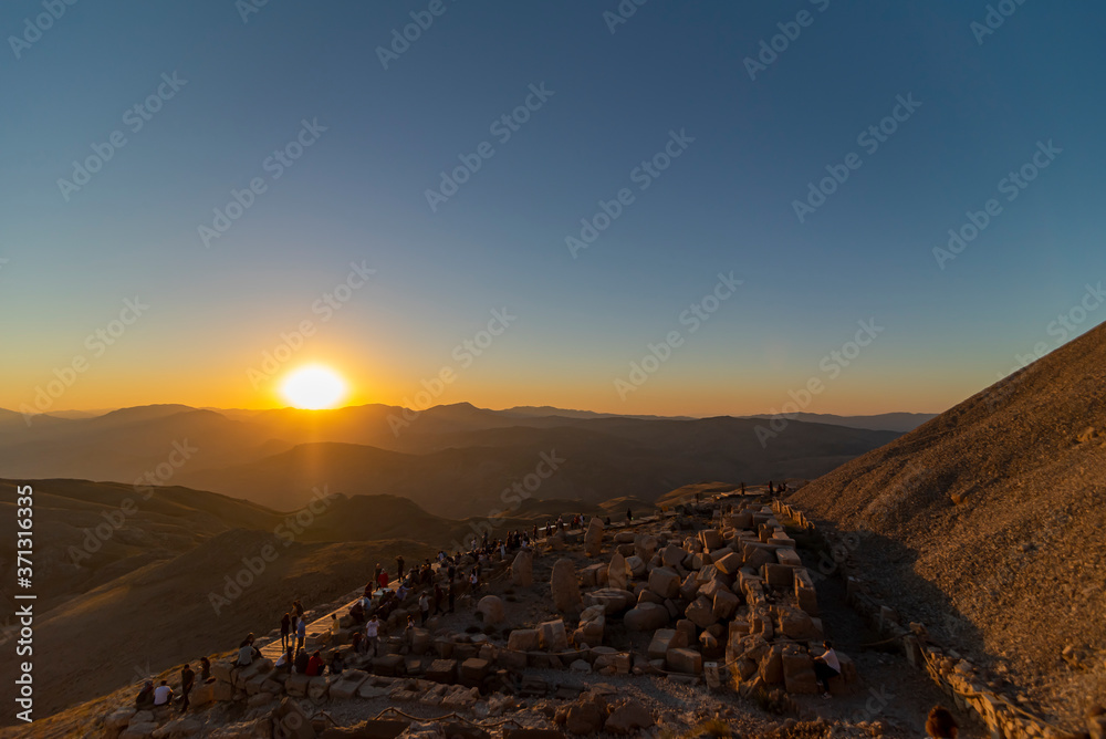 Statues on top of the Nemrut Mountain in Adiyaman, Turkey. To watch the sun set and rise.