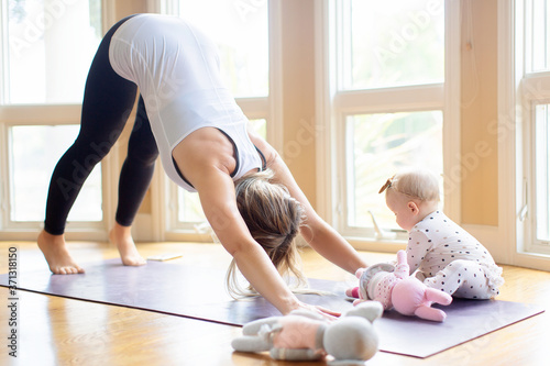woman's fitness with baby at home