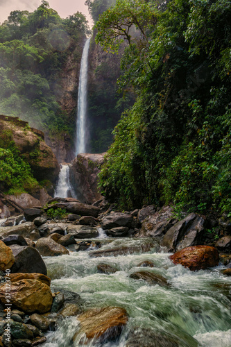 Machay river waterfall in the light of dawn in Baños, Tungurahua, Ecuador.