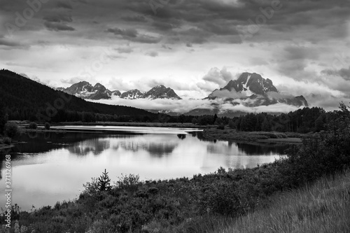 Oxbow Bend in Wyoming at the Grand Teton National Park shown in black and white with dramatic clouds