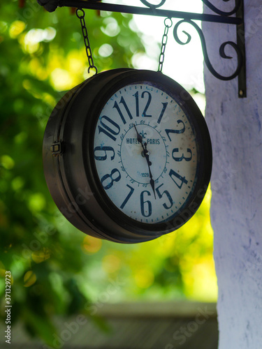 old clock in the park street vintage hour