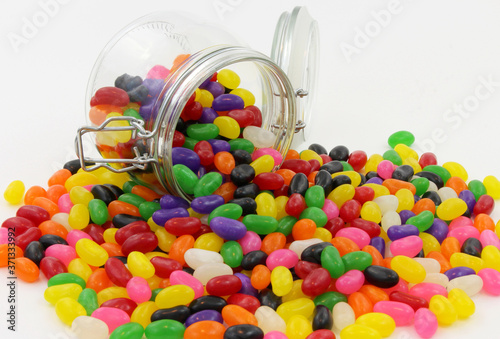 Spilt Jelly Beans from Glass Jar with Lid