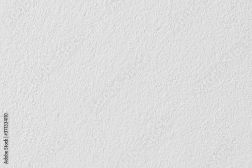 Light white color concrete wall texture for background and design.