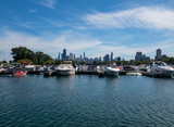 view of downtown Chicago skyline past  Diversey Harbor boats in Chicago, Illinois