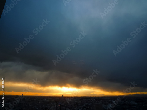 Solar light to come in through between the dark earth and cloud