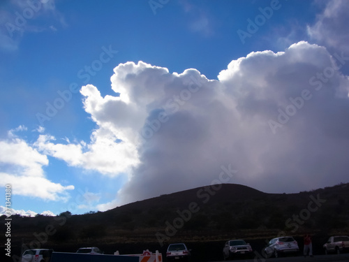 The huge cloud which approaches from the other side of the mountain