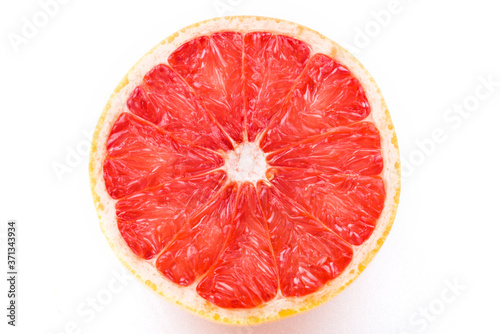 Sliced       grapefruit on white background