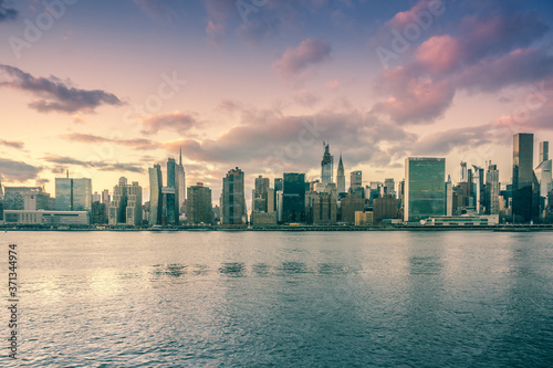 An aerial view of NYC skyline. Skyscrapers of midtown in Manhattan along East river