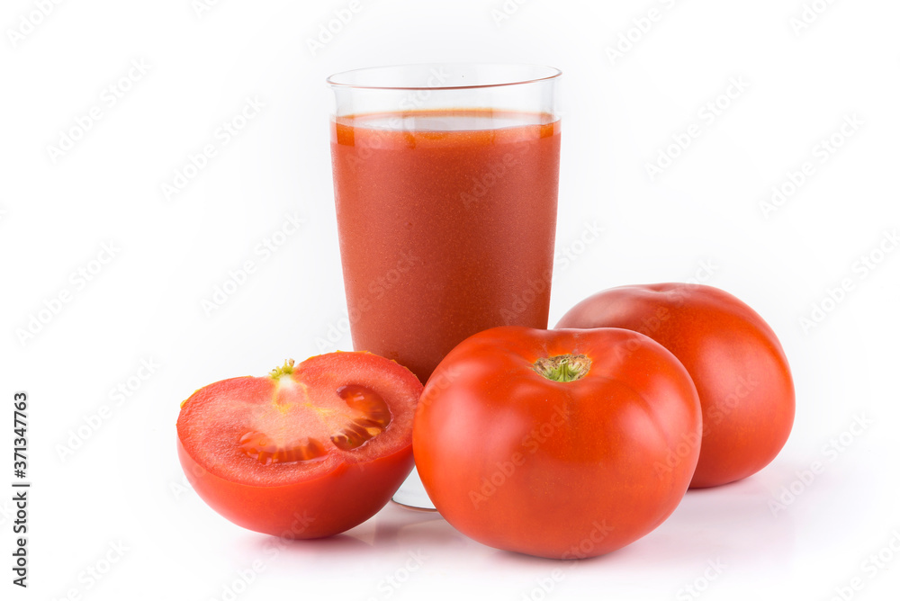 Tomato juice. Ripe tomatoes and glass of tomato juice on white background Tomato juice. Ripe tomatoes and glass of tomato juice on white background