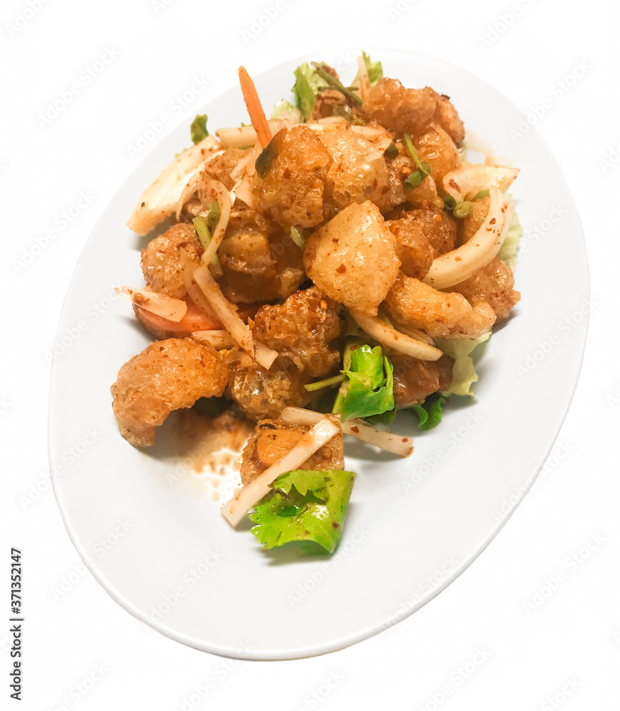 Crispy crackling salad or pork skin stir salad, Thai food on white background