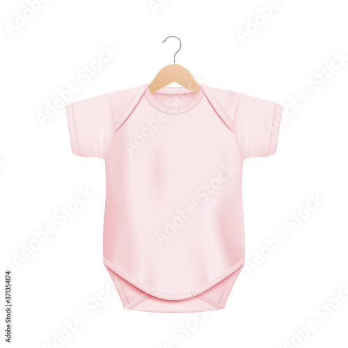 Realistic light pink baby onesie shirt mockup on wooden hanger
