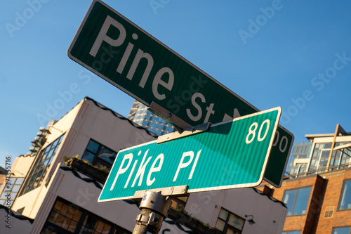 street sign of Pike Street and Pine Street intersection © Aleksandar