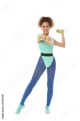 Young woman doing aerobics on white background