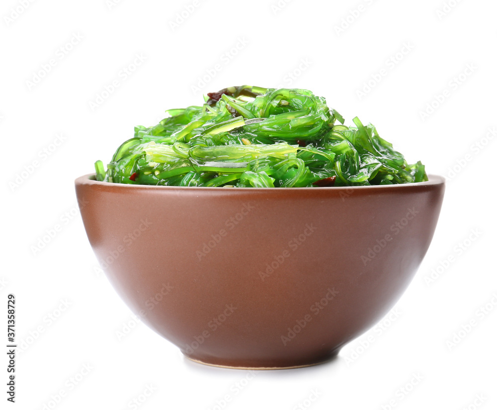 Bowl with tasty seaweed salad on white background Bowl with tasty seaweed salad on white background