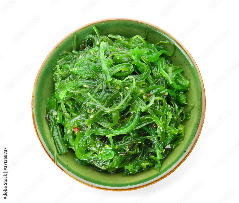 Bowl with tasty seaweed salad on white background Bowl with tasty seaweed salad on white background