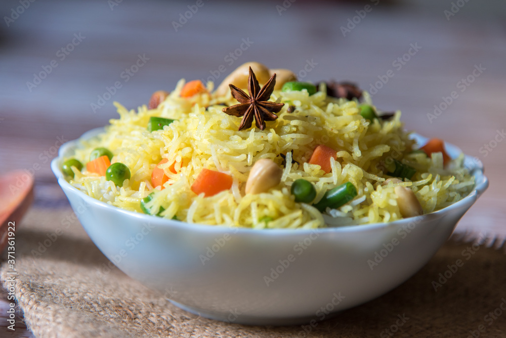 Star anise on flavoured rice with vegetable Star anise on flavoured rice with vegetable