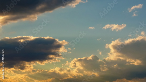 A cloud and the sky which shine in gold